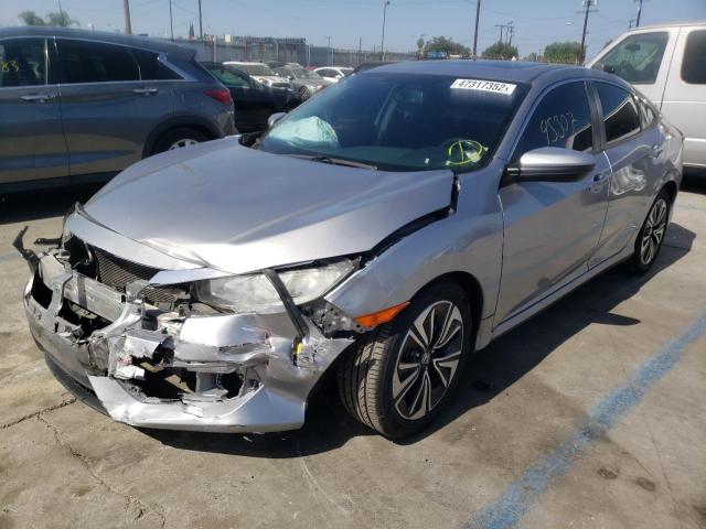 Photo 2 from auction – 2016 HONDA CIVIC EXL with VIN 2HGFC1F7XGH633852