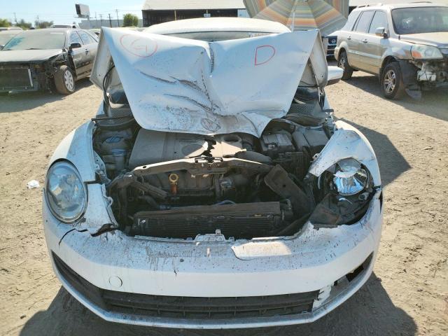 Photo 10 from auction – 2013 VOLKSWAGEN BEETLE with VIN 3VWJP7AT2DM683174