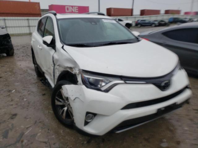 TOYOTA RAV4 XLE 2017 with VIN JTMRFREV5HJ106884 - Photo from auction
