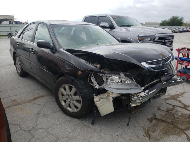 TOYOTA CAMRY LE 2004 with VIN 4T1BF30K44U072341 - Photo from auction