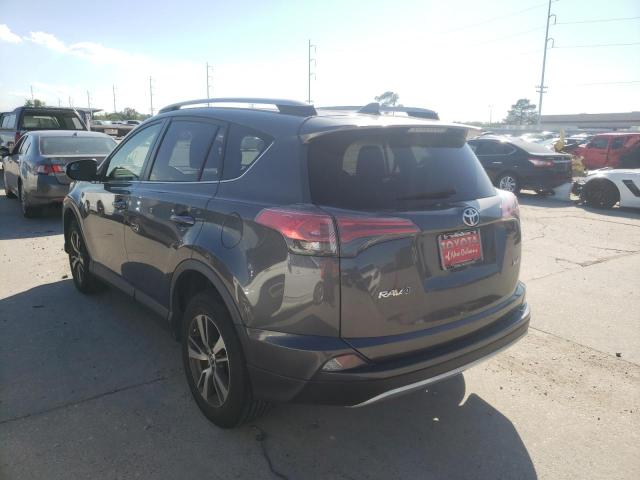 Photo 3 from auction – 2017 TOYOTA RAV4 XLE with VIN JTMWFREV5HD100651