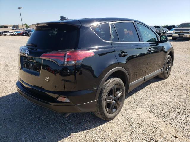 Photo 4 from auction – 2018 TOYOTA RAV4 LE with VIN 2T3BFREV8JW773294