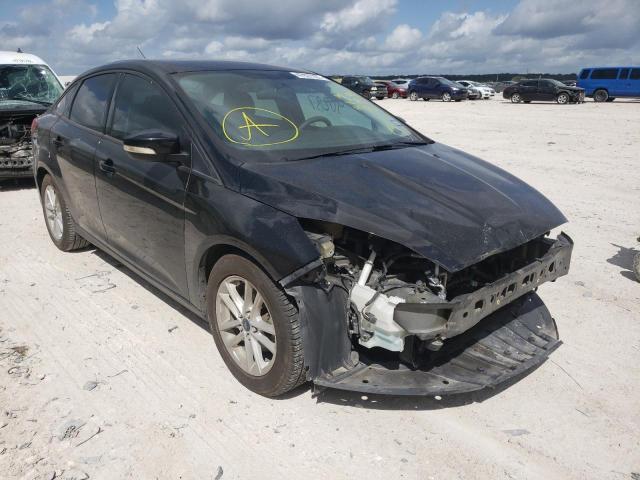 FORD FOCUS SE 2015 with VIN 1FADP3F21FL313773 - Photo from auction