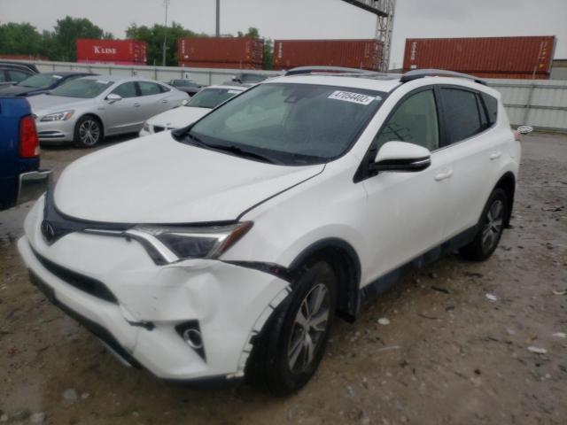 Photo 2 from auction – 2017 TOYOTA RAV4 XLE with VIN JTMRFREV5HJ106884