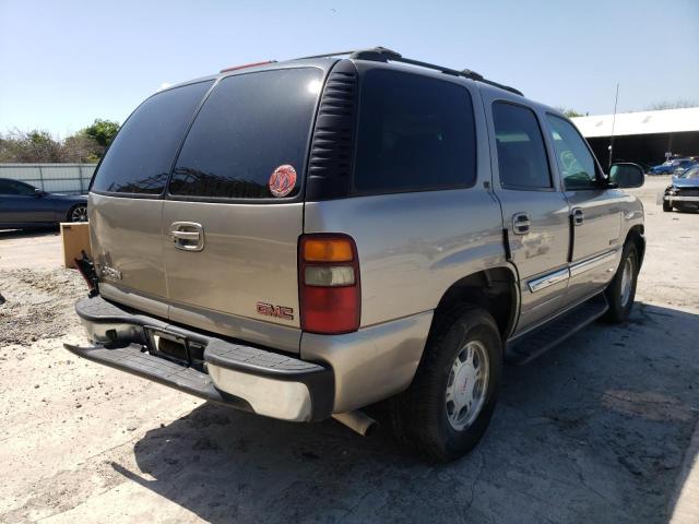 Photo 4 from auction – 2002 GMC YUKON with VIN 1GKEC13V22R241118