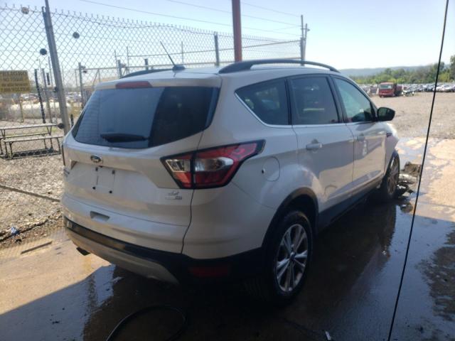 Photo 4 from auction – 2018 FORD ESCAPE SE with VIN 1FMCU9GD1JUC99809