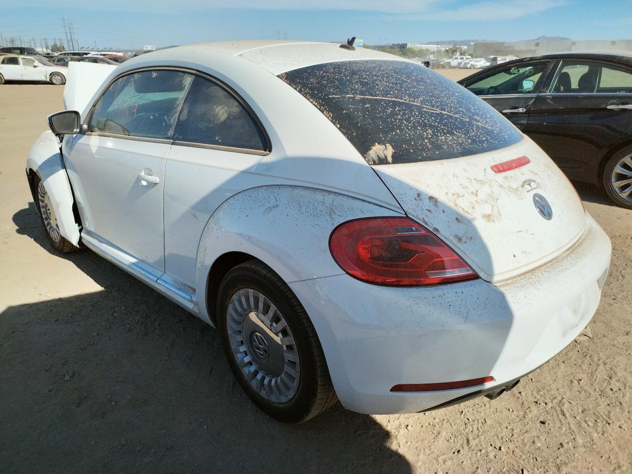 Photo 16 from auction – 2013 VOLKSWAGEN BEETLE with VIN 3VWJP7AT2DM683174