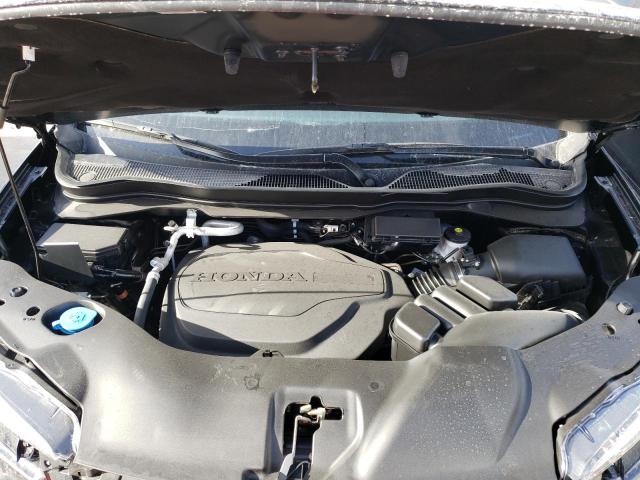 Photo 7 from auction – 2021 HONDA PASSPORT E with VIN 5FNYF7H59MB014187