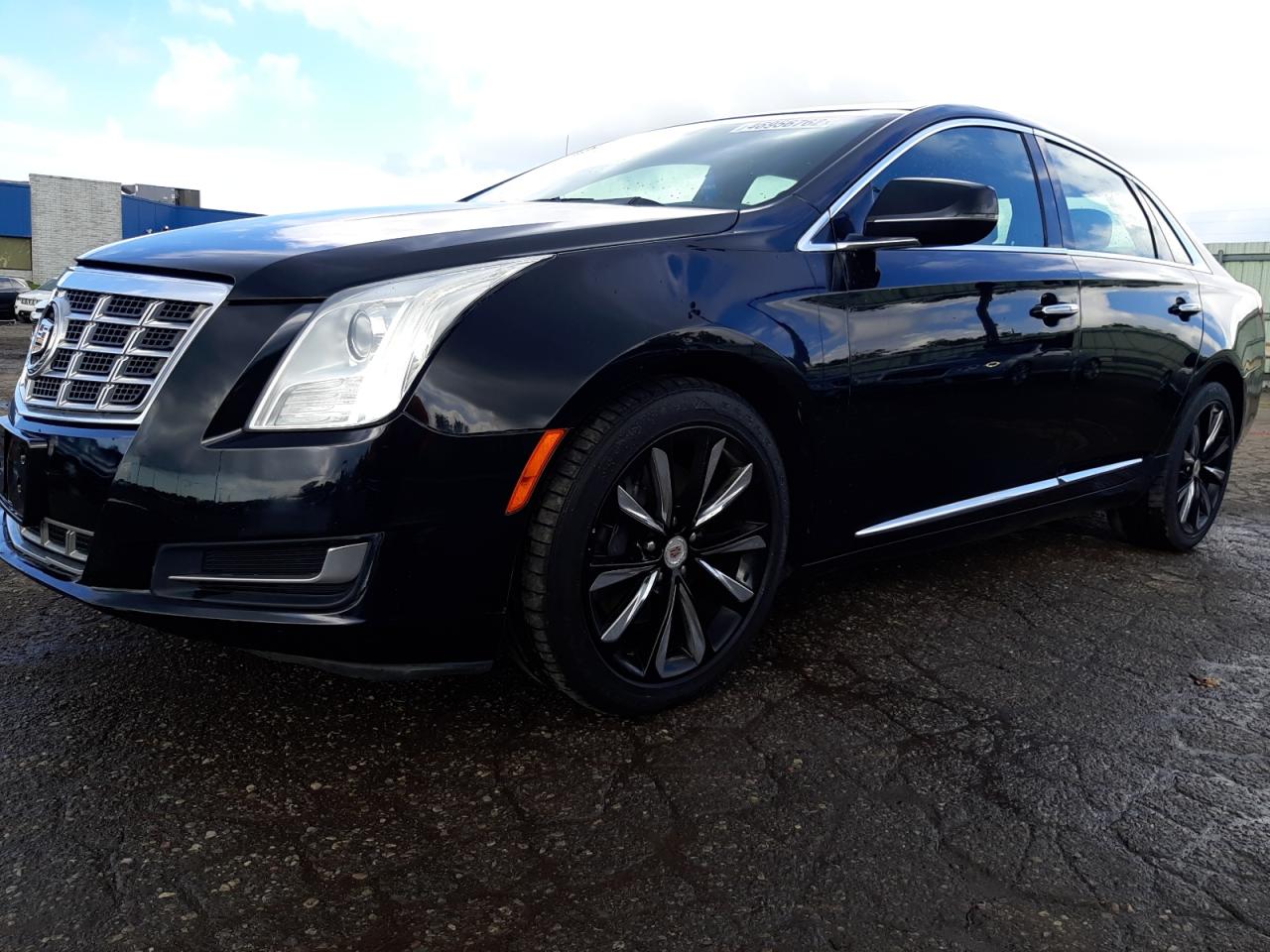 Photo 15 from auction – 2014 CADILLAC XTS with VIN 2G61U5S30E9283674