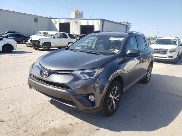Photo 2 from auction – 2017 TOYOTA RAV4 XLE with VIN JTMWFREV5HD100651
