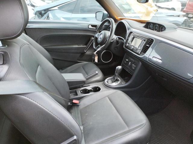 Photo 5 from auction – 2014 VOLKSWAGEN BEETLE with VIN 3VW5L7AT8EM820813