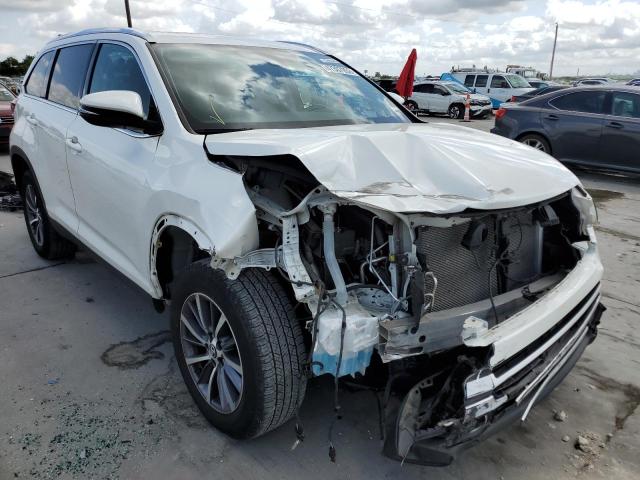 TOYOTA HIGHLANDER 2019 with VIN 5TDKZRFH0KS312092 - Photo from auction
