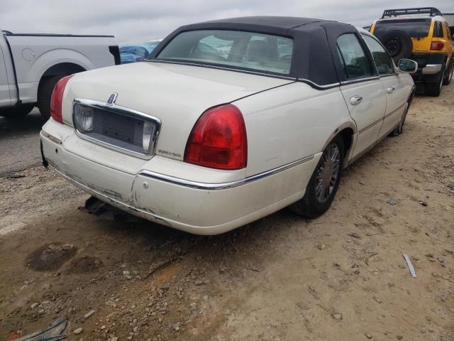 Photo 4 from auction – 2004 LINCOLN TOWN CAR U with VIN 1LNHM83W24Y604092