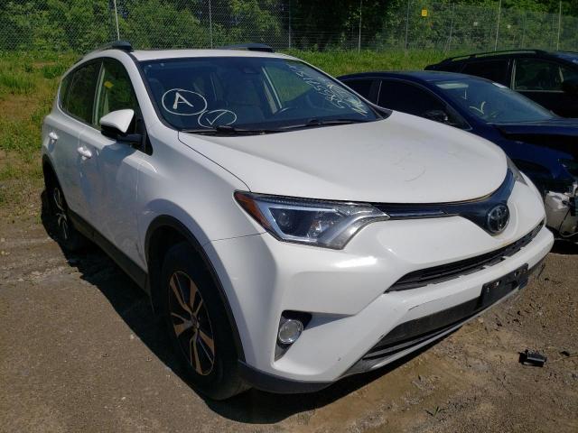 TOYOTA RAV4 XLE 2017 with VIN JTMRFREV1HD204874 - Photo from auction
