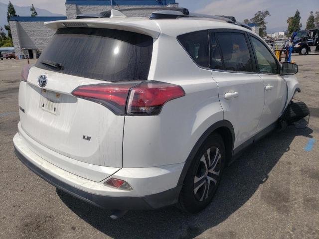 Photo 4 from auction – 2016 TOYOTA RAV4 LE with VIN JTMZFREV8GJ084118