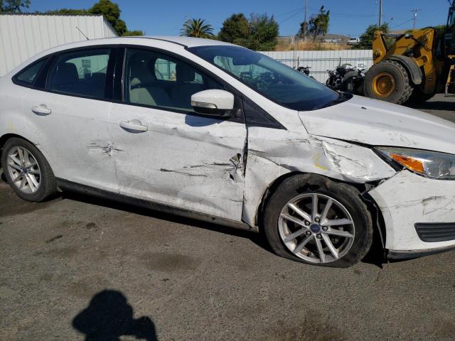 Photo 9 from auction – 2016 FORD FOCUS SE with VIN 1FADP3F28GL263942