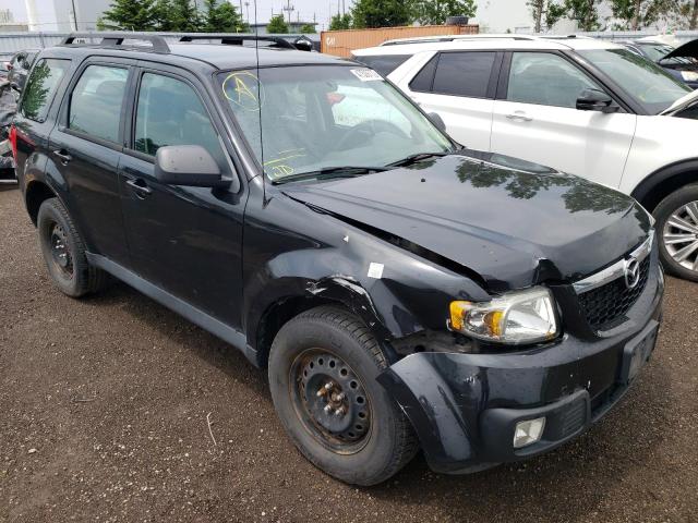 MAZDA TRIBUTE I 2011 with VIN 4F2CY0C75BKM01260 - Photo from auction