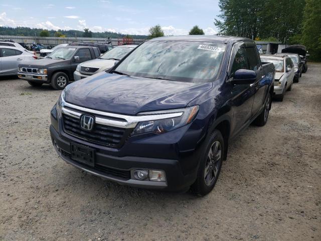 Photo 2 from auction – 2018 HONDA RIDGELINE with VIN 5FPYK3F73JB013354
