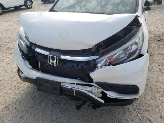 Photo 9 from auction – 2015 HONDA CR-V LX with VIN 5J6RM4H35FL103580