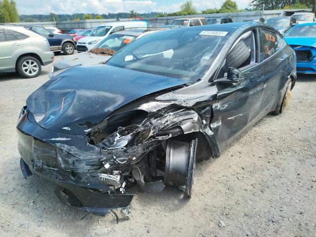 Photo 2 from auction – 2021 TESLA MODEL Y with VIN 5YJYGAEEXMF214106