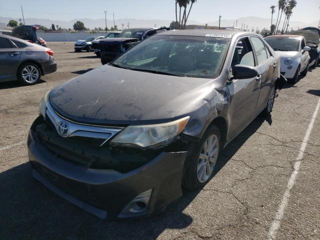Photo 2 from auction – 2014 TOYOTA CAMRY HYBR with VIN 4T1BD1FK4EU112498