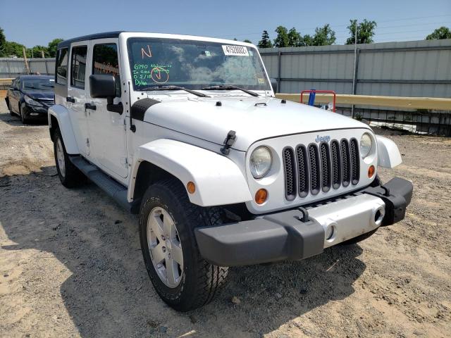 JEEP WRANGLER U 2011 with VIN 1J4BA5H16BL609444 - Photo from auction