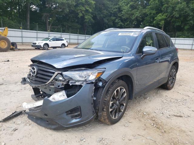 Photo 2 from auction – 2016 MAZDA CX-5 GT with VIN JM3KE2DY2G0694309