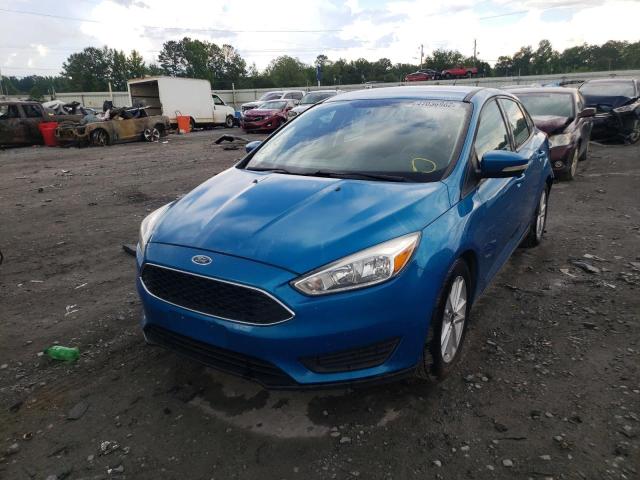 Photo 2 from auction – 2016 FORD FOCUS SE with VIN 1FADP3F24GL293231