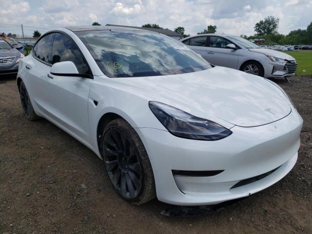 TESLA MODEL 3 2021 with VIN 5YJ3E1EC9MF013425 - Photo from auction