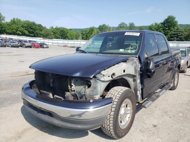 Photo 2 from auction – 2001 FORD F150 SUPER with VIN 1FTRW07W71KF74567
