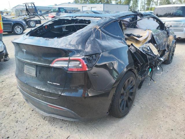 Photo 4 from auction – 2021 TESLA MODEL Y with VIN 5YJYGAEEXMF214106