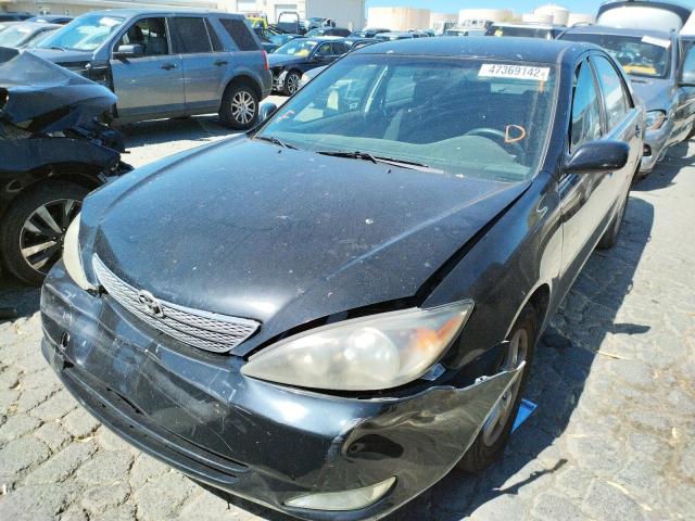 Photo 2 from auction – 2002 TOYOTA CAMRY LE with VIN JTDBF32K020065649