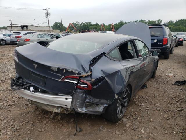Photo 4 from auction – 2021 TESLA MODEL 3 with VIN 5YJ3E1EAXMF086351