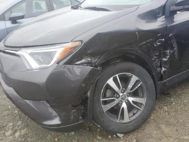 Photo 9 from auction – 2018 TOYOTA RAV4 LE with VIN 2T3ZFREV5JW431672