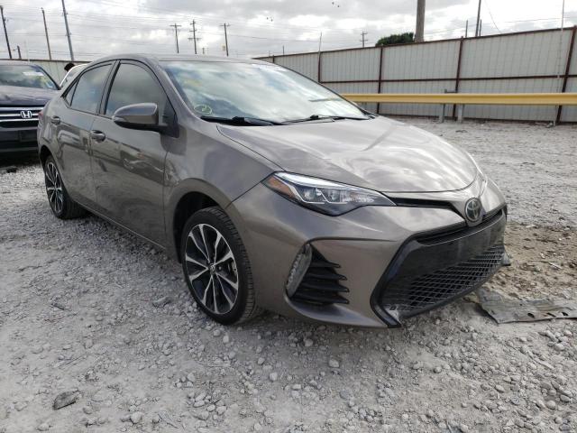 TOYOTA COROLLA L 2018 with VIN 5YFBURHE2JP749858 - Photo from auction