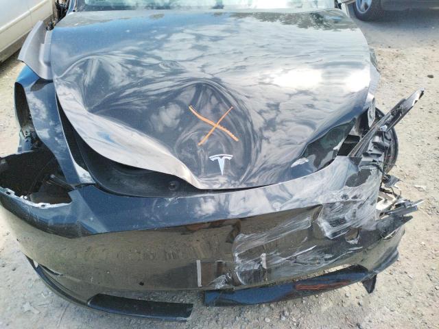 Photo 7 from auction – 2021 TESLA MODEL Y with VIN 5YJYGAEEXMF214106