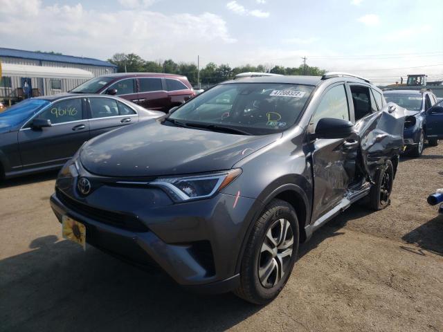 Photo 2 from auction – 2017 TOYOTA RAV4 LE with VIN JTMBFREV8HD200452