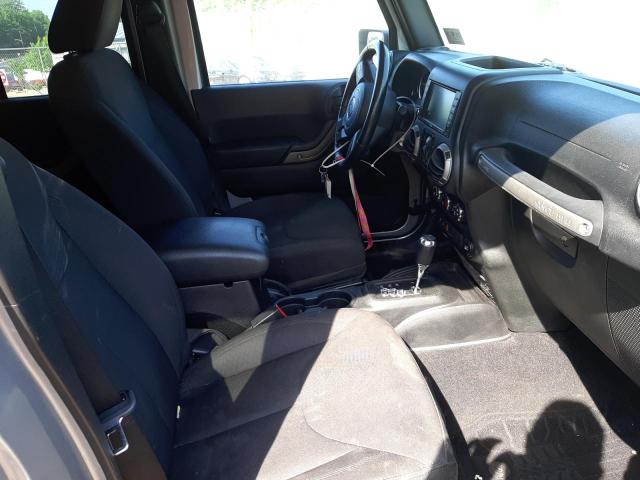 Photo 5 from auction – 2015 JEEP WRANGLER U with VIN 1C4BJWDG8FL557956