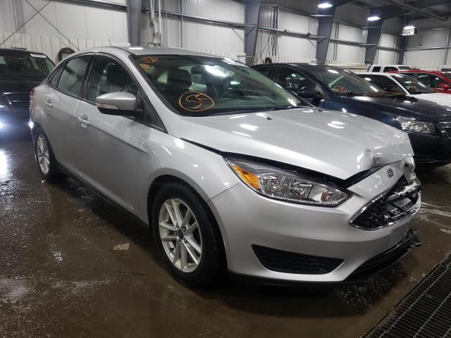 FORD FOCUS SE 2015 with VIN 1FADP3F20FL317698 - Photo from auction