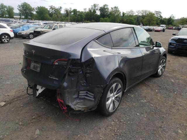 Photo 4 from auction – 2021 TESLA MODEL Y with VIN 5YJYGDEE2MF074702