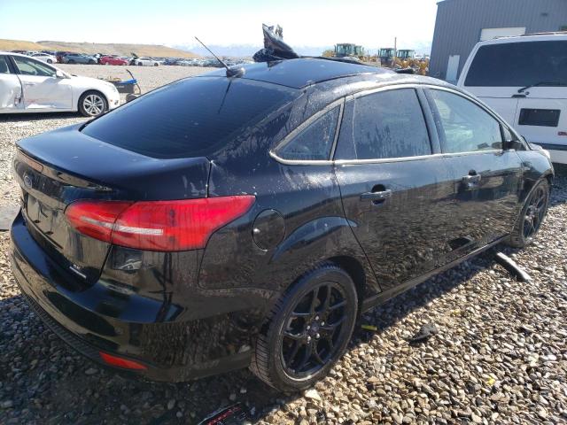 Photo 4 from auction – 2016 FORD FOCUS SE with VIN 1FADP3F21GL275656