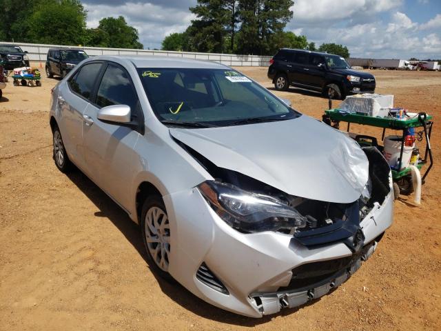 TOYOTA COROLLA L 2019 with VIN 5YFBURHE7KP890071 - Photo from auction