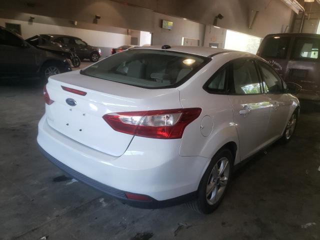 Foto 4 de la subasta – 2013 FORD FOCUS SE con VIN 1FADP3F24DL294715