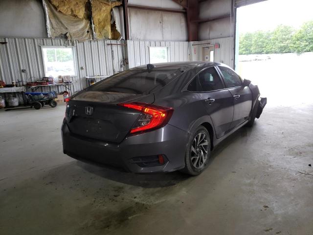 Photo 4 from auction – 2018 HONDA CIVIC EX with VIN 19XFC2F79JE201180