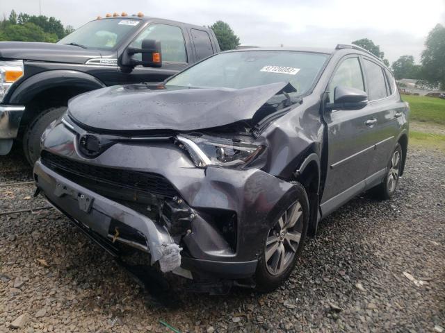 Photo 2 from auction – 2017 TOYOTA RAV4 XLE with VIN JTMRFREV9HJ118360