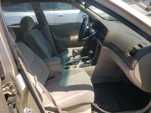 Photo 5 from auction – 1998 MAZDA 626 DX with VIN 1YVGF22C1W5770178