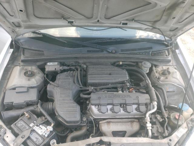 Photo 7 from auction – 2003 HONDA CIVIC LX with VIN 1HGEM225X3L037138