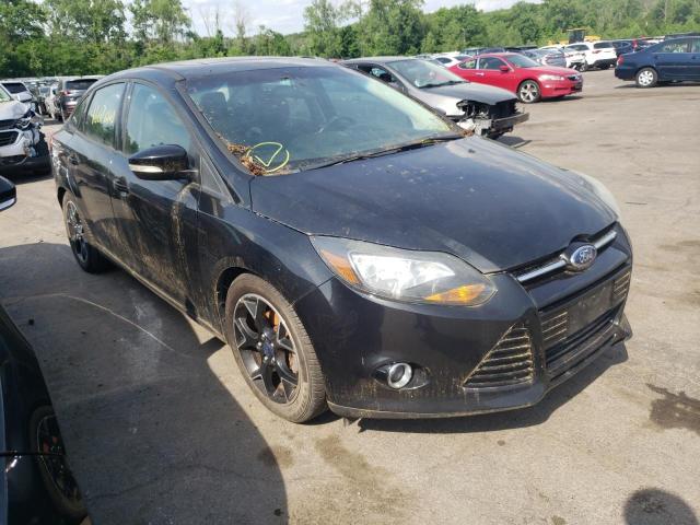 FORD FOCUS 2014 with VIN 1FADP3F2XEL274258 - Photo from auction
