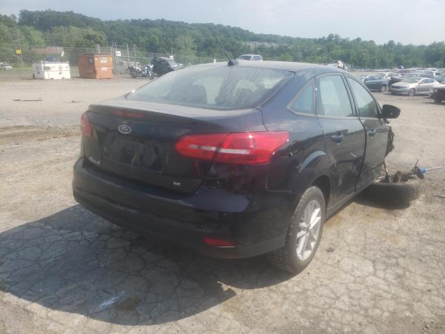 Photo 4 from auction – 2017 FORD FOCUS SE with VIN 1FADP3F27HL288428