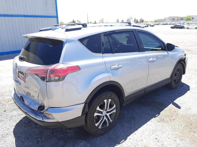 Photo 4 from auction – 2018 TOYOTA RAV4 LE with VIN 2T3ZFREV9JW515624